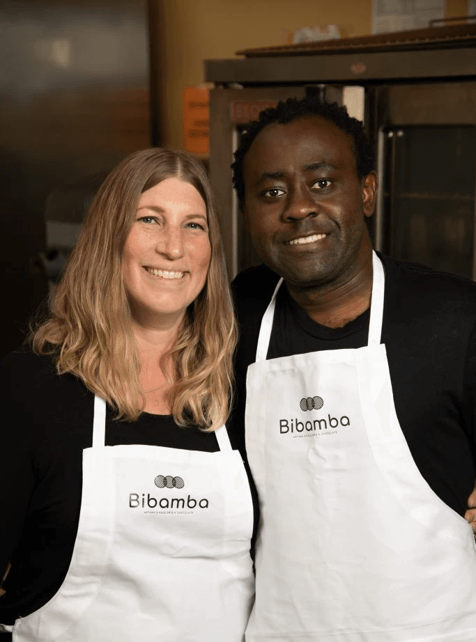 Bibamba co-founders Mara and Patrick Tcheunou wearing Bibamba aprons
